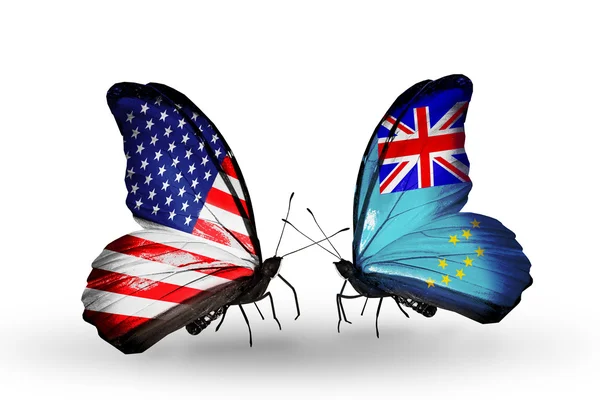 Twee vlinders met vlaggen op vleugels als symbool van betrekkingen VS en tuvalo — Stockfoto