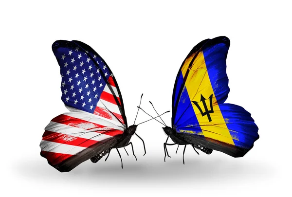 Two butterflies with flags on wings as symbol of relations USA and Barbados — Stock Photo, Image