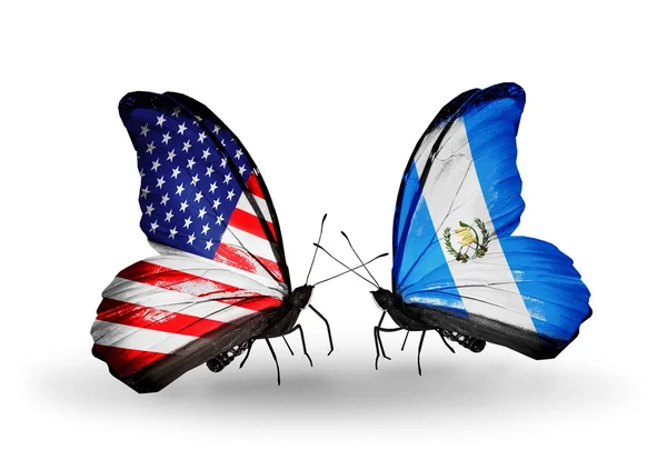 Two butterflies with flags on wings as symbol of relations USA and Guatemala — Stock Photo, Image