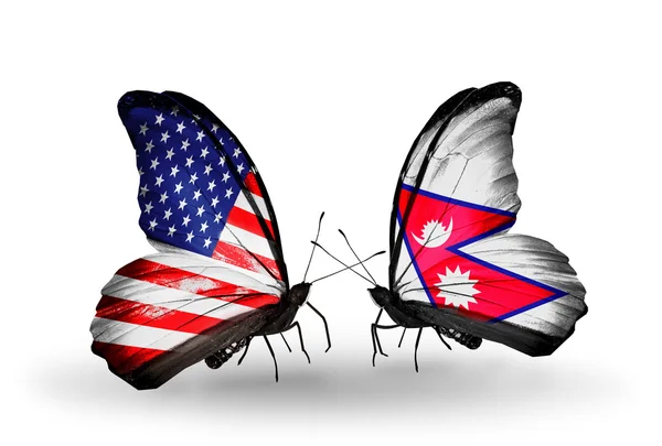 Due farfalle con bandiere sulle ali come simbolo delle relazioni USA e Nepal — Foto Stock