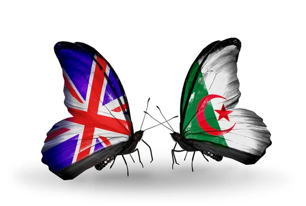 Two butterflies with flags on wings as symbol of relations UK and Algeria — Stock Photo, Image