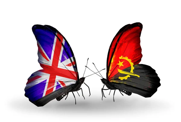 Two butterflies with flags on wings as symbol of relations UK and Angola — Stock Photo, Image