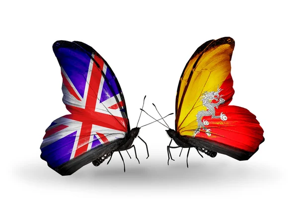 Two butterflies with flags on wings as symbol of relations UK and Bhutan — Stock Photo, Image