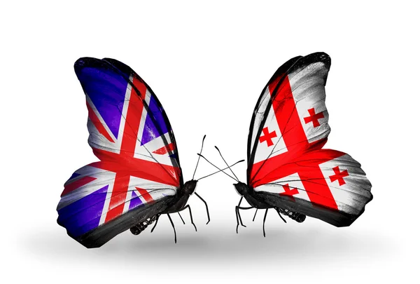 Two butterflies with flags on wings as symbol of relations UK and Georgia — Stock Photo, Image