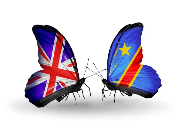 Dos mariposas con banderas en alas como símbolo de relaciones Reino Unido y Kongo —  Fotos de Stock