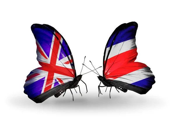 Two butterflies with flags on wings as symbol of relations UK and Costa Rica — Stock Photo, Image