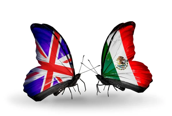 Two butterflies with flags on wings as symbol of relations UK and Mexico — Stock Photo, Image