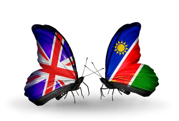 Due farfalle con bandiere sulle ali come simbolo delle relazioni Regno Unito e Myanmar — Foto Stock