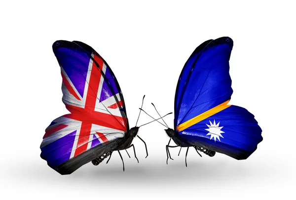 Two butterflies with flags on wings as symbol of relations UK and Nauru — Stock Photo, Image