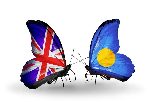 Two butterflies with flags on wings as symbol of relations UK and Palau — Stock Photo, Image