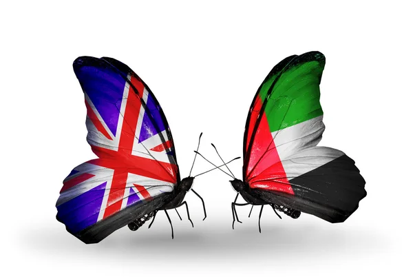 Two butterflies with flags on wings as symbol of relations UK and UAE — Stock Photo, Image