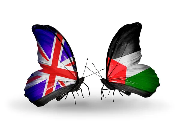 Two butterflies with flags on wings as symbol of relations UK and Palestine — Stock Photo, Image