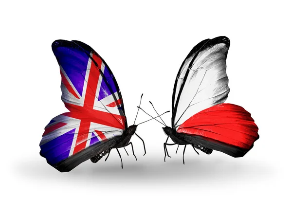 Two butterflies with flags on wings as symbol of relations UK and Poland — Stock Photo, Image