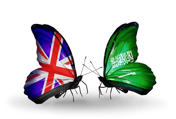 Two butterflies with flags on wings as symbol of relations UK and Saudi Arabia — Stock Photo, Image