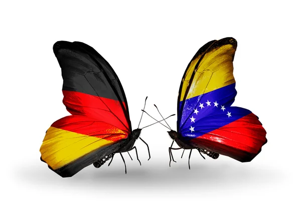 İki kanat bayrakları ile ilişkileri sembolü olarak Almanya ve venezuela kelebekler — Stok fotoğraf