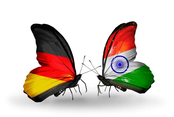 Two butterflies with flags on wings as symbol of relations Germany and India — Stock Photo, Image