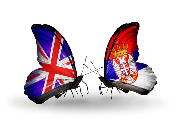 Two butterflies with flags on wings as symbol of relations UK and Serbia — Stock Photo, Image