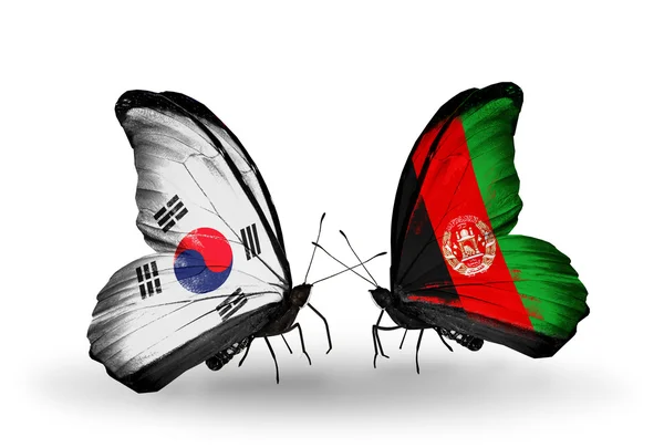 Két pillangók szárnyain zászlókkal kapcsolatok jelképe Dél-Koreában és Afganisztán — Stock Fotó