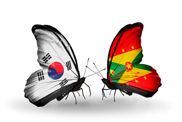 Twee vlinders met vlaggen op vleugels als symbool van de betrekkingen, Zuid-korea en grenada — Stockfoto