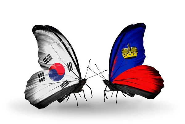 Two butterflies with flags on wings as symbol of relations South Korea and Liechtenstein — Stock Photo, Image