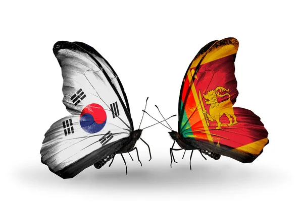 Two butterflies with flags on wings as symbol of relations South Korea and Sri Lanka — Stock Photo, Image