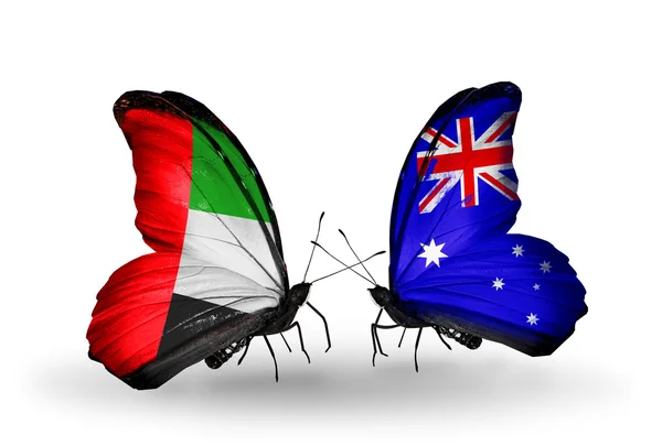 Two butterflies with flags on wings as symbol of relations UAE and Australia — Stock Photo, Image