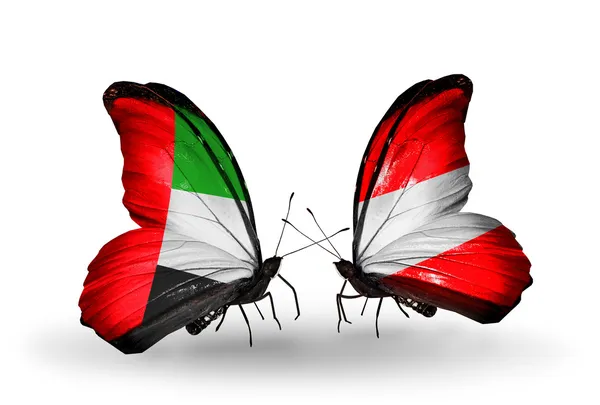 Dos mariposas con banderas en alas como símbolo de relaciones Emiratos Árabes Unidos y Austria — Foto de Stock