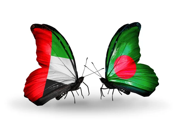 Zwei Schmetterlinge mit Flaggen auf Flügeln als Symbol der Beziehungen uae und bangladesh — Stockfoto