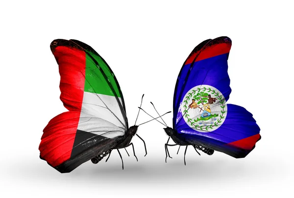 Two butterflies with flags on wings as symbol of relations UAE and Belize — Stock Photo, Image