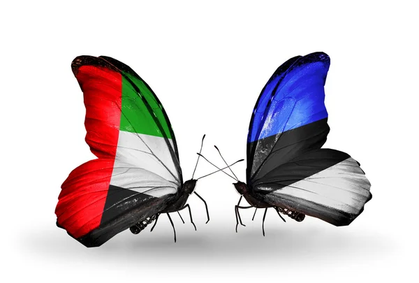 Two butterflies with flags on wings as symbol of relations UAE and Estonia — Stock Photo, Image