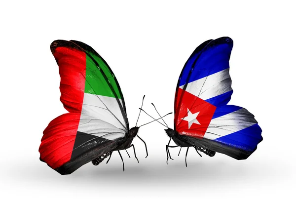 Two butterflies with flags on wings as symbol of relations UAE and Cuba — Stock Photo, Image