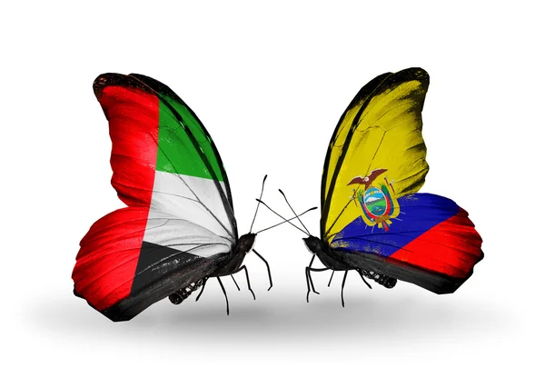 Две бабочки с флагами на крыльях как символ отношений ОАЭ и Эквадора — стоковое фото