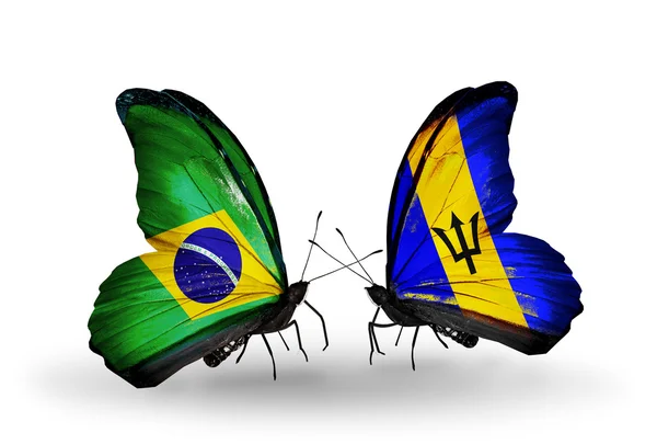 Dos mariposas con banderas en alas como símbolo de relaciones Brasil y Barbados — Foto de Stock