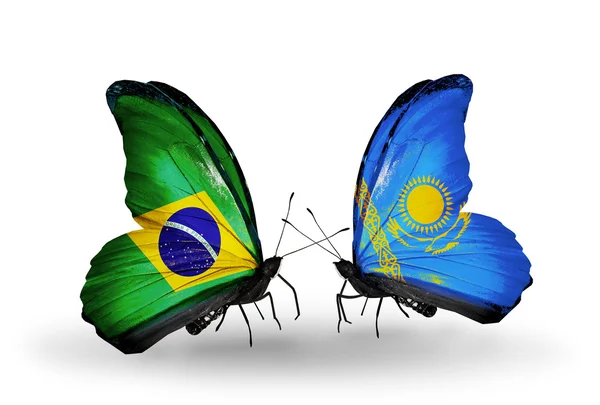 Two butterflies with flags on wings as symbol of relations Brazil and Kazakhstan — Stock Photo, Image