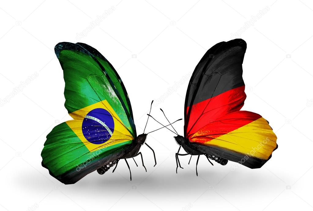 Two butterflies with flags on wings as symbol of relations Brazil and Germany