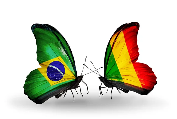 Two butterflies with flags on wings as symbol of relations Brazil and Mali — Stock Photo, Image