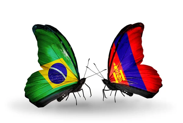 Dos mariposas con banderas en alas como símbolo de relaciones Brasil y Mongolia — Foto de Stock