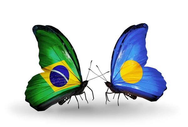 Two butterflies with flags on wings as symbol of relations Brazil and Palau — Stock Photo, Image