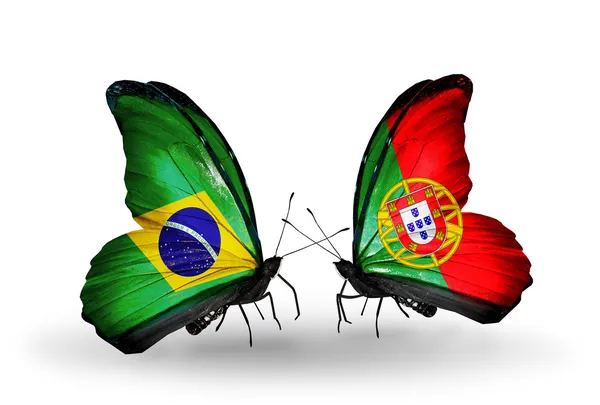 Dos mariposas con banderas en alas como símbolo de relaciones Brasil y Portugal —  Fotos de Stock