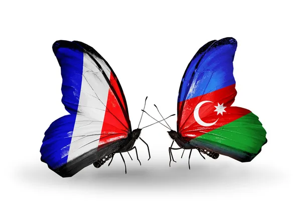 Two butterflies with flags on wings as symbol of relations France and Azerbaijan — Stock Photo, Image