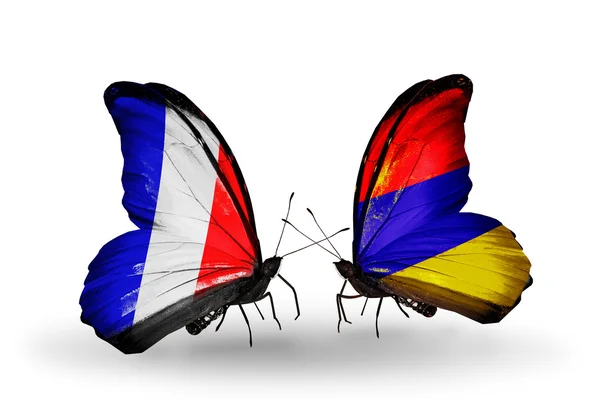 Two butterflies with flags on wings as symbol of relations France and Armenia — Stock Photo, Image