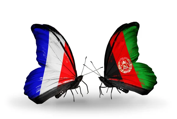 Deux papillons avec des drapeaux sur les ailes comme symbole des relations France-Afghanistan — Photo