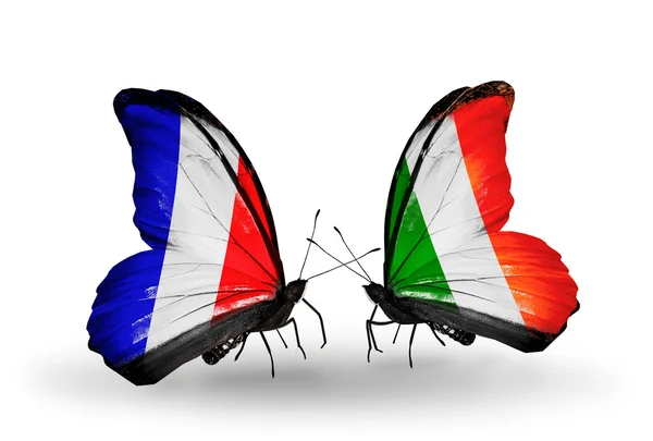 Two butterflies with flags on wings as symbol of relations France and Ireland — Stock Photo, Image