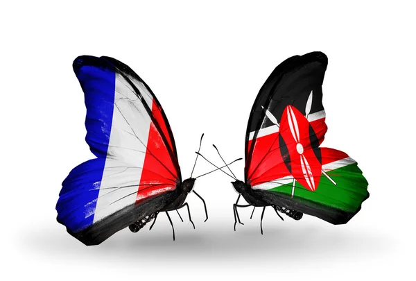 Two butterflies with flags on wings as symbol of relations France and Kenya — Stock Photo, Image