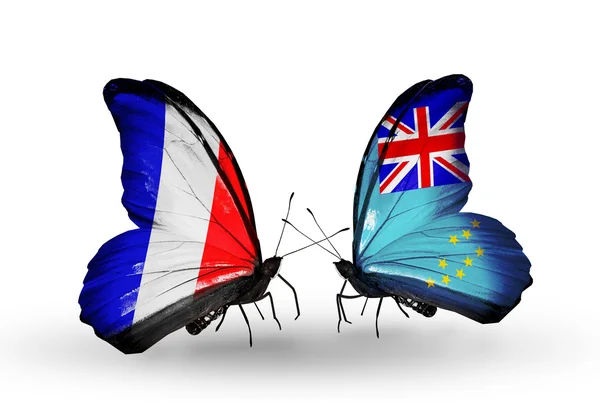 Two butterflies with flags on wings as symbol of relations France and Fiji — Stock Photo, Image