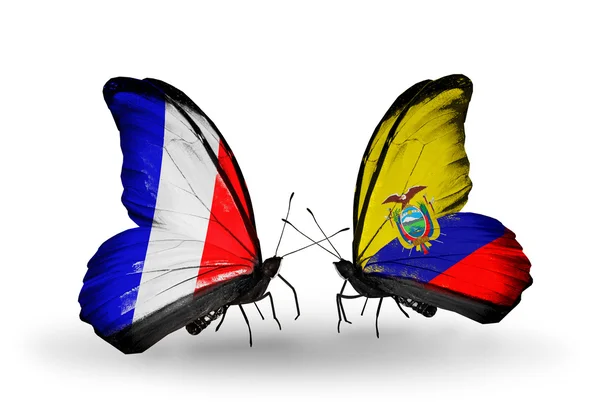 Two butterflies with flags on wings as symbol of relations France and Ecuador — Stock Photo, Image