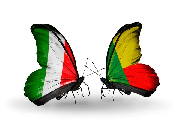 Two butterflies with flags on wings as symbol of relations Italy and Benin — Stock Photo, Image