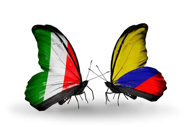 Deux papillons avec des drapeaux sur les ailes comme symbole des relations Italie et Colombie — Photo