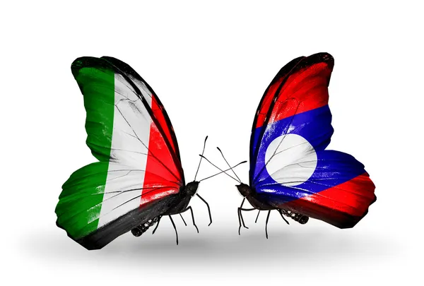 Dos mariposas con banderas en alas como símbolo de relaciones Italia y Laos — Foto de Stock