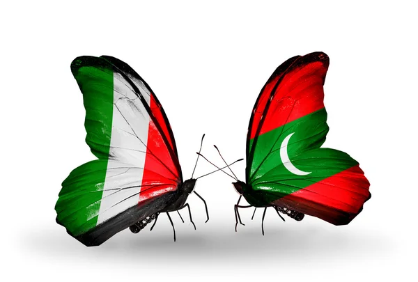 Two butterflies with flags on wings as symbol of relations Italy and Maldives — Stock Photo, Image